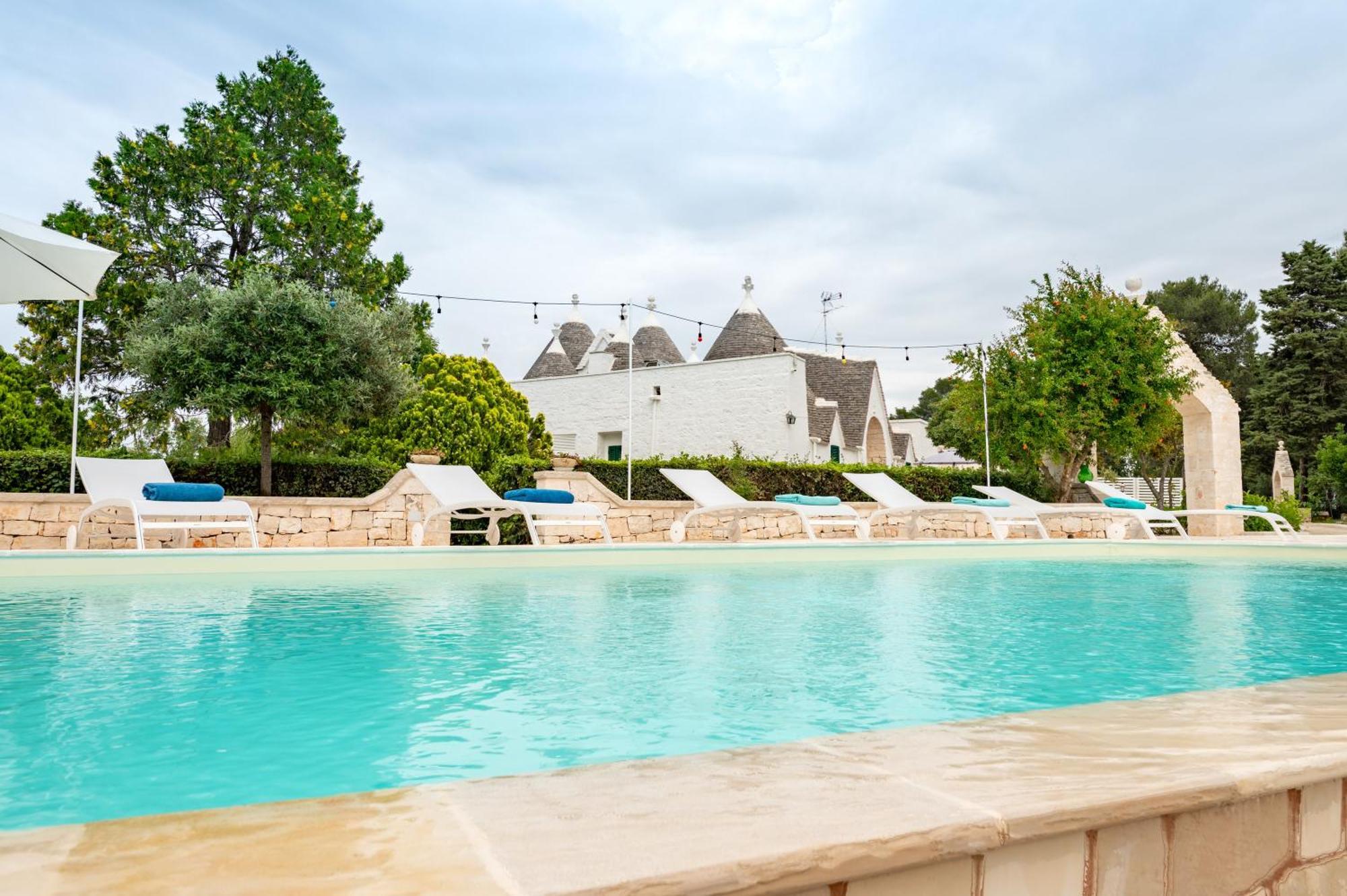 Trullo Degli Anelli In Masseria Cisternino Eksteriør billede