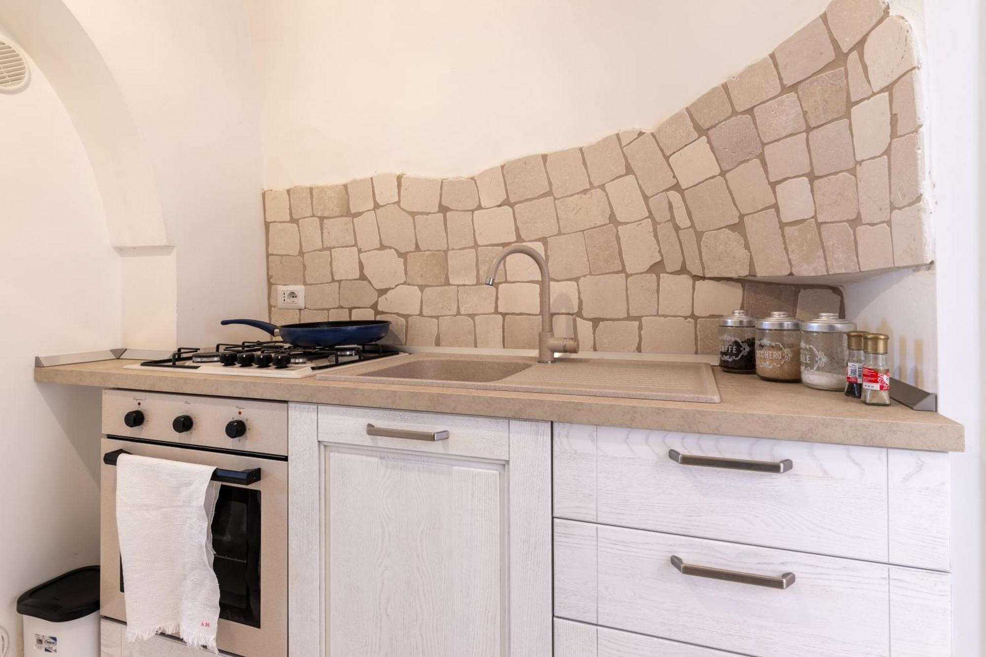 Trullo Degli Anelli In Masseria Cisternino Eksteriør billede