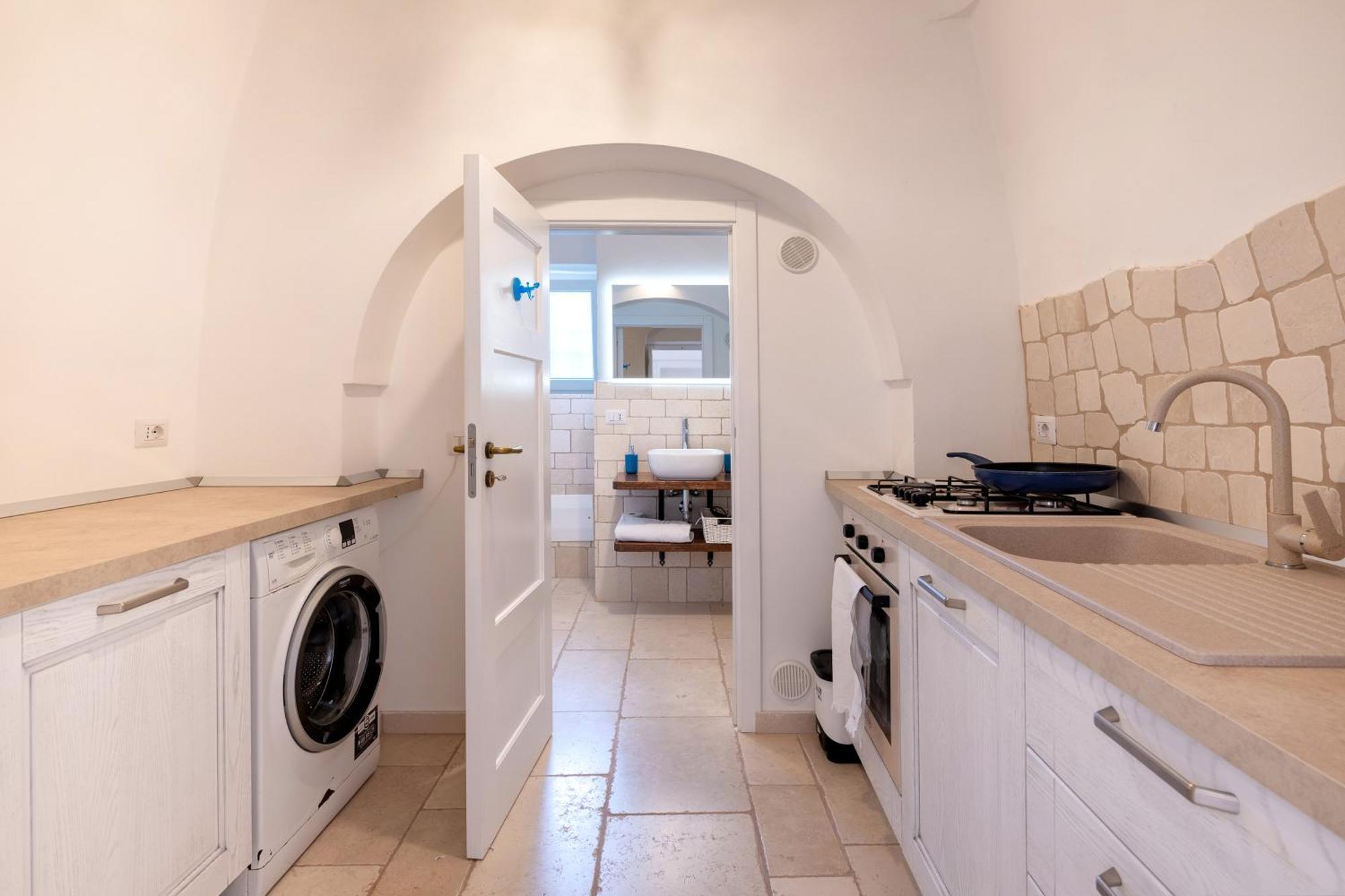 Trullo Degli Anelli In Masseria Cisternino Eksteriør billede