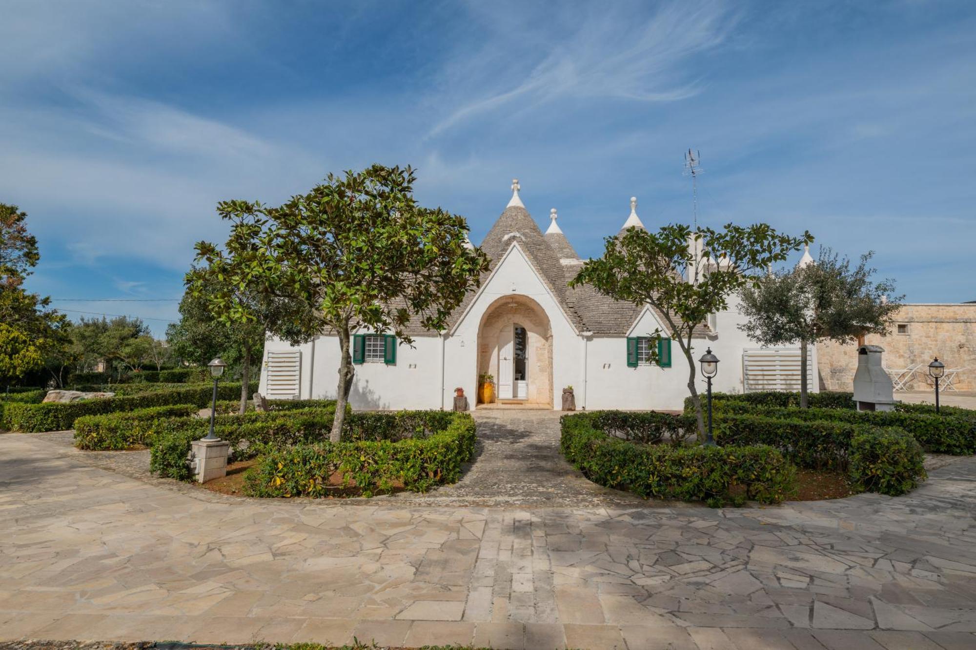 Trullo Degli Anelli In Masseria Cisternino Eksteriør billede