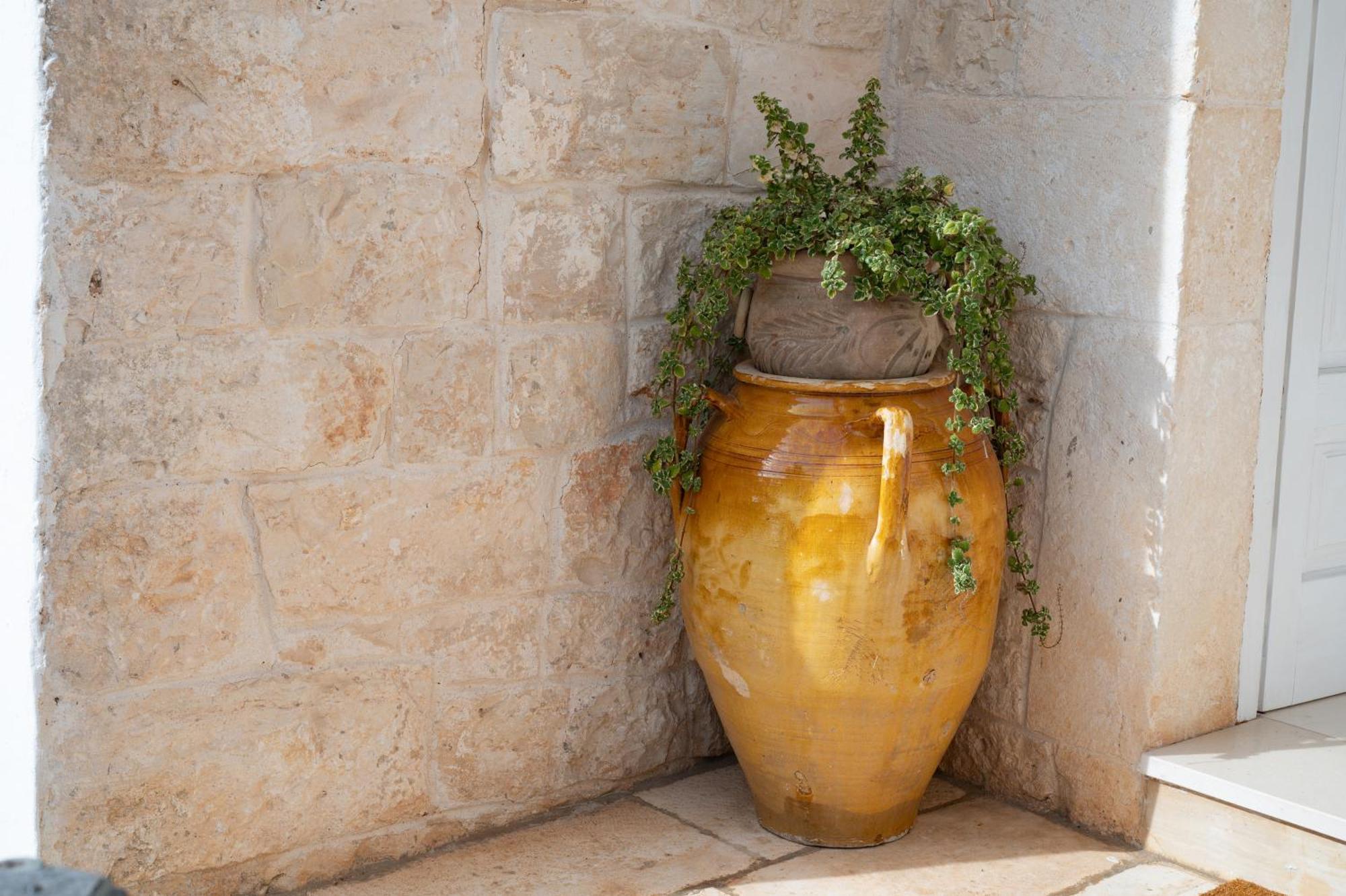 Trullo Degli Anelli In Masseria Cisternino Eksteriør billede