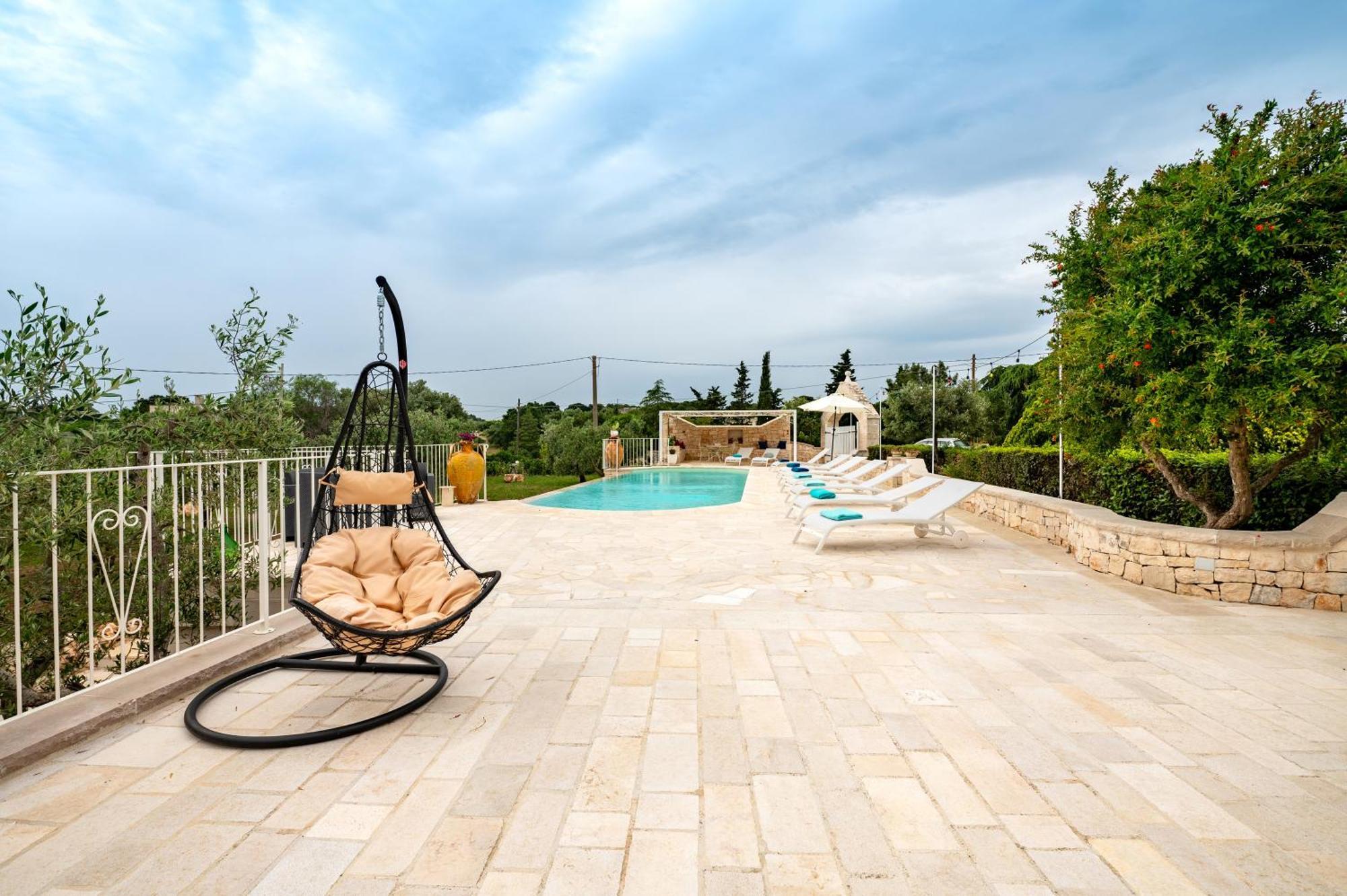 Trullo Degli Anelli In Masseria Cisternino Eksteriør billede