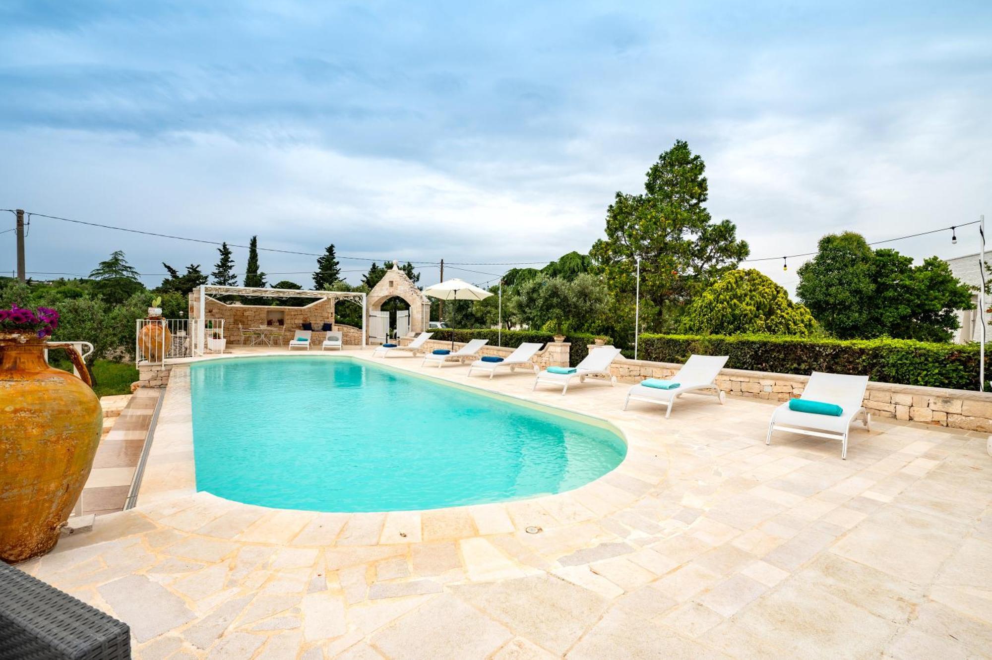 Trullo Degli Anelli In Masseria Cisternino Eksteriør billede
